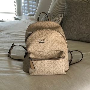 Guess ivory and tan backpack